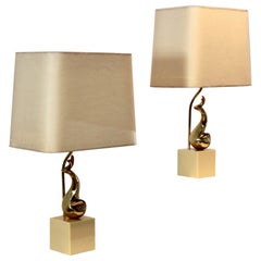 Coppia di esclusive lampade da tavolo con scultura d'arte in ottone di Philippe Jean, firmate