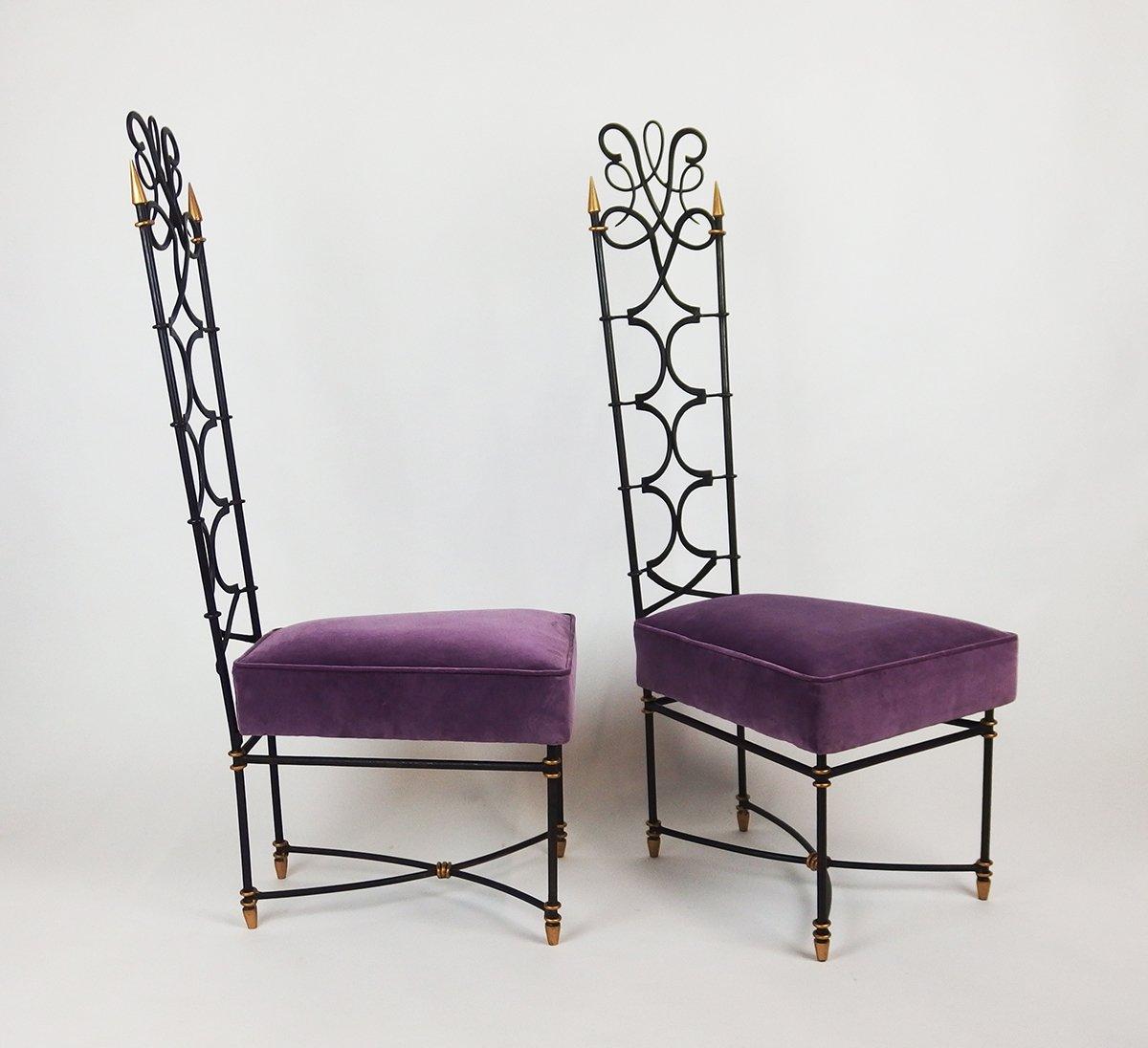 Extremely Elegant pair of French Art Deco side chairs 
made of wrought iron with black patina and gilded details. Seat upholstery renewed with mauve velvet, 
in the style of Raymond Subes, France, around 1935.
(Raymond Subes (1893-1970) was a