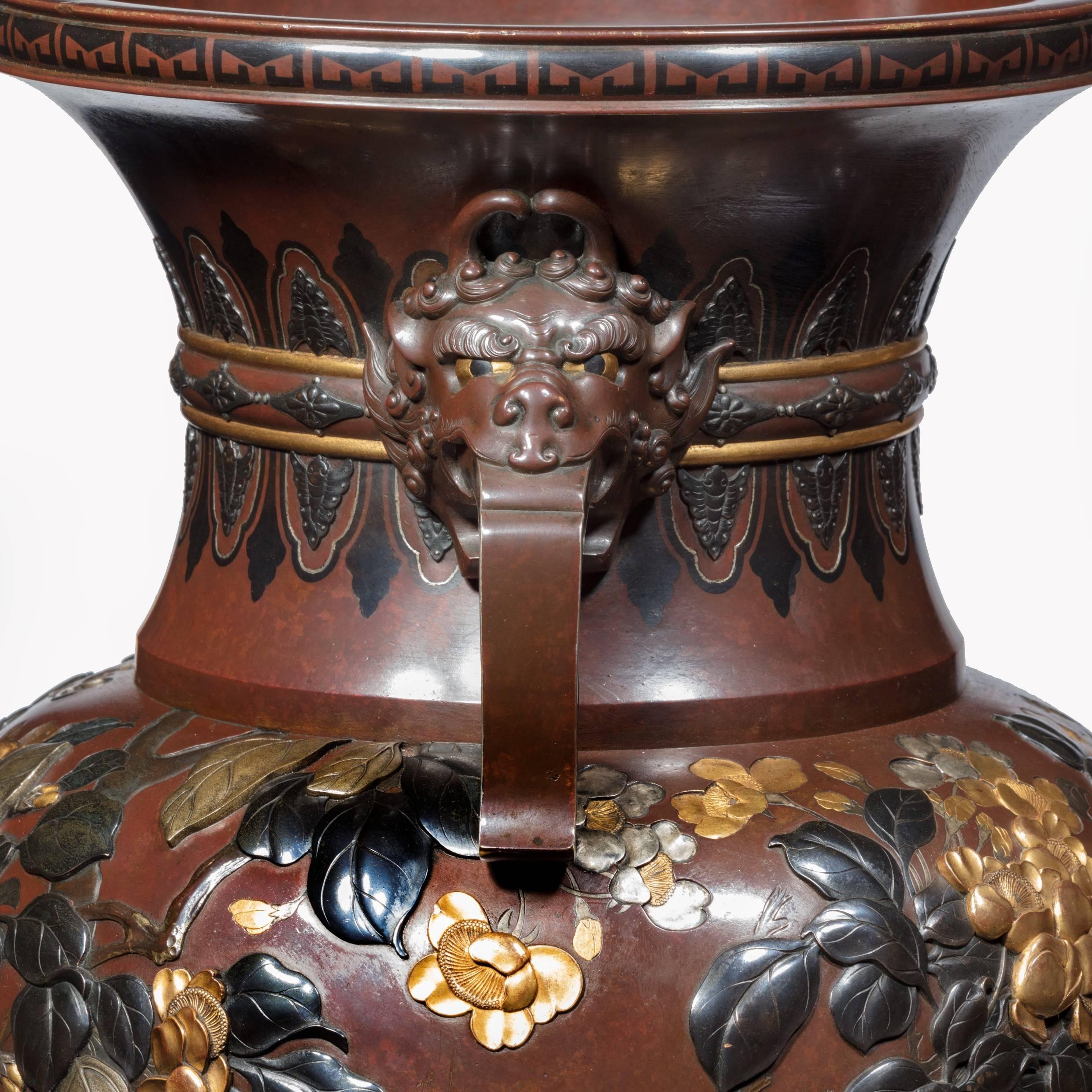Late 19th Century Pair of Exhibition Quality Meiji Period Rotating Bronze and Mixed Metal Vases For Sale