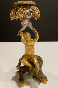 Pair Of Exotic Gilt And Patinated Bronze Candle Sticks