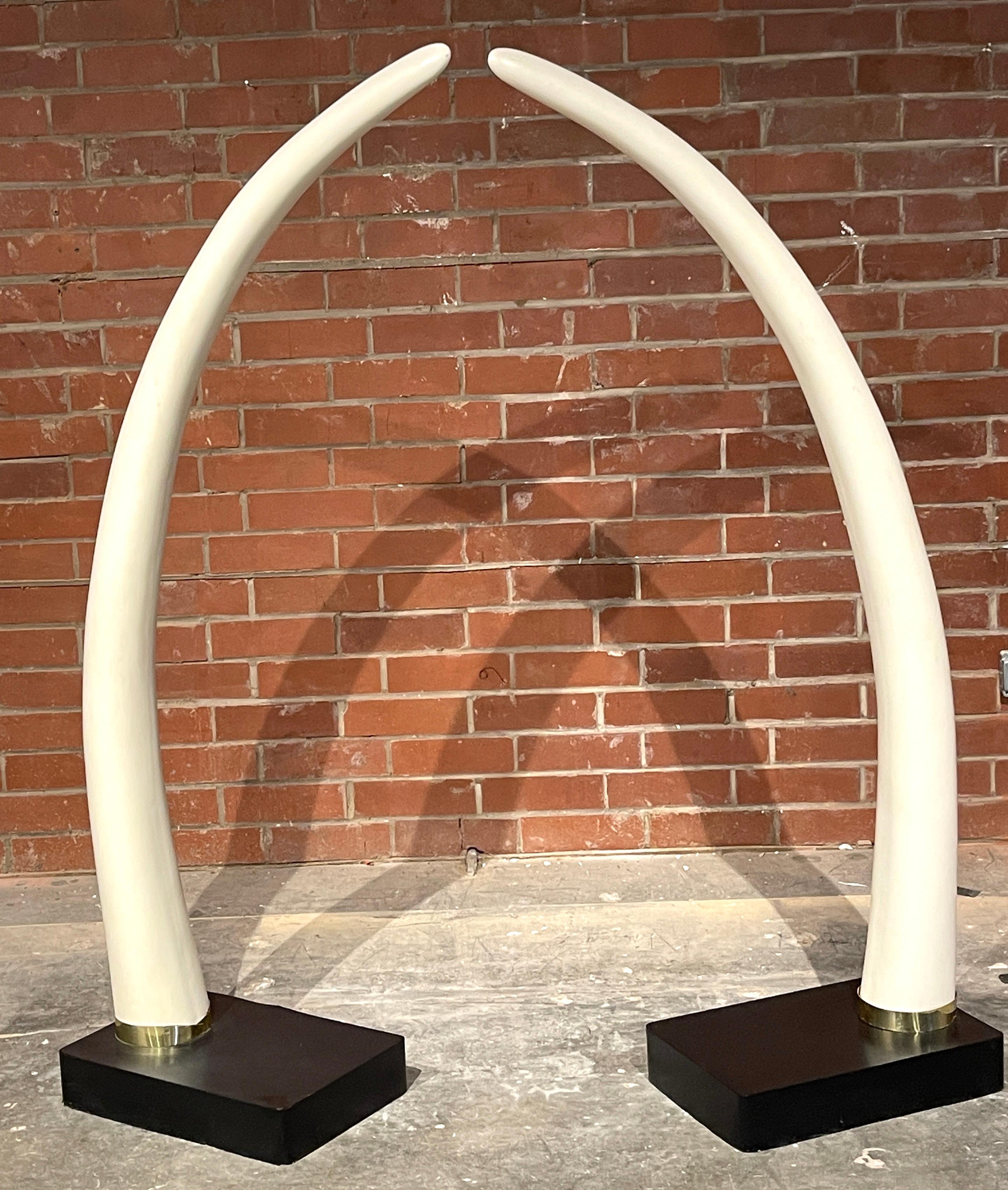 Ebonized Pair of Exotic Mid Century Lacquered Faux Elephant Tusk Sculptures For Sale