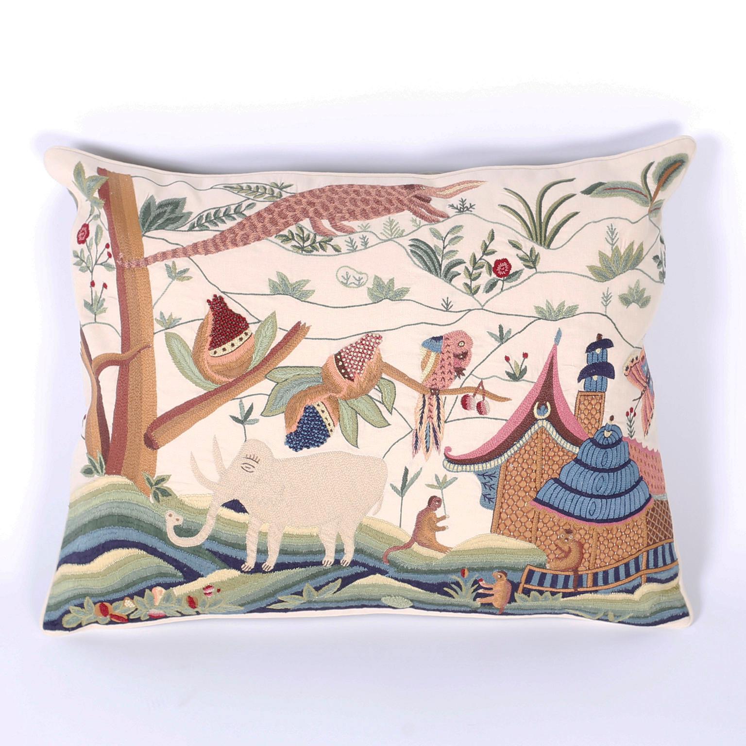 Fanciful pair of needlework pillows depicting an amusing array of animals; featuring an elephant, an alligator, birds, monkeys, plants, and a pagoda. Priced individually.