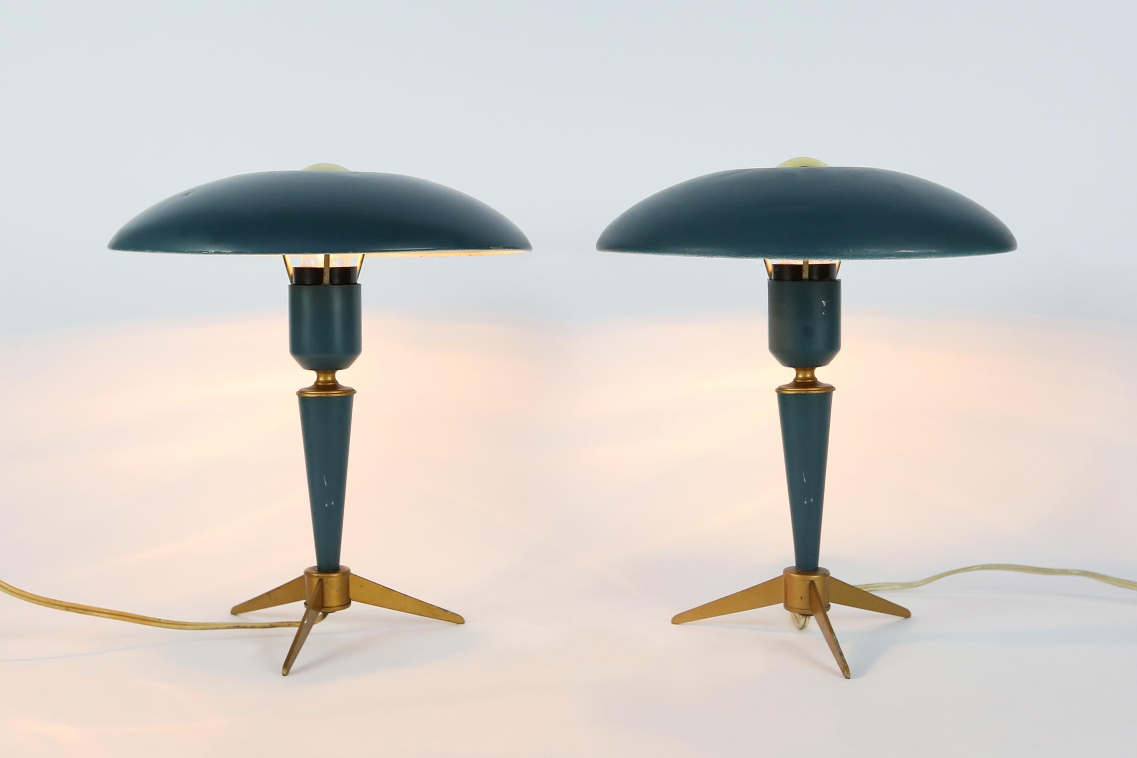 Set of 2 tripod table lamps by Louis Kalff for Philips, Dutch, 1950s. Produced in Belgium. 

The architect and designer Louis Kalff (1897-1976) joined Philips in 1925. Kalff set out to modernize the visual image of the company straight away by
