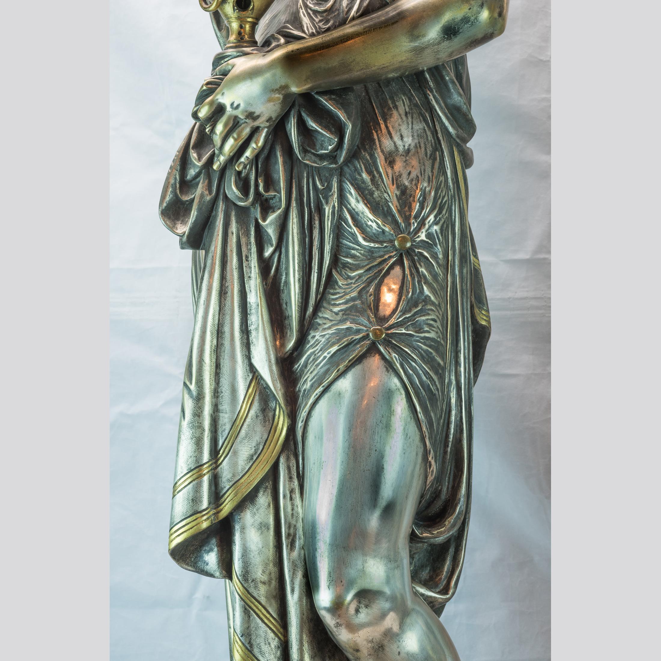 Pair of Exposition Neo-Grec Silvered and Gilt Bronze Figural Bacchante Torchères In Good Condition For Sale In New York, NY