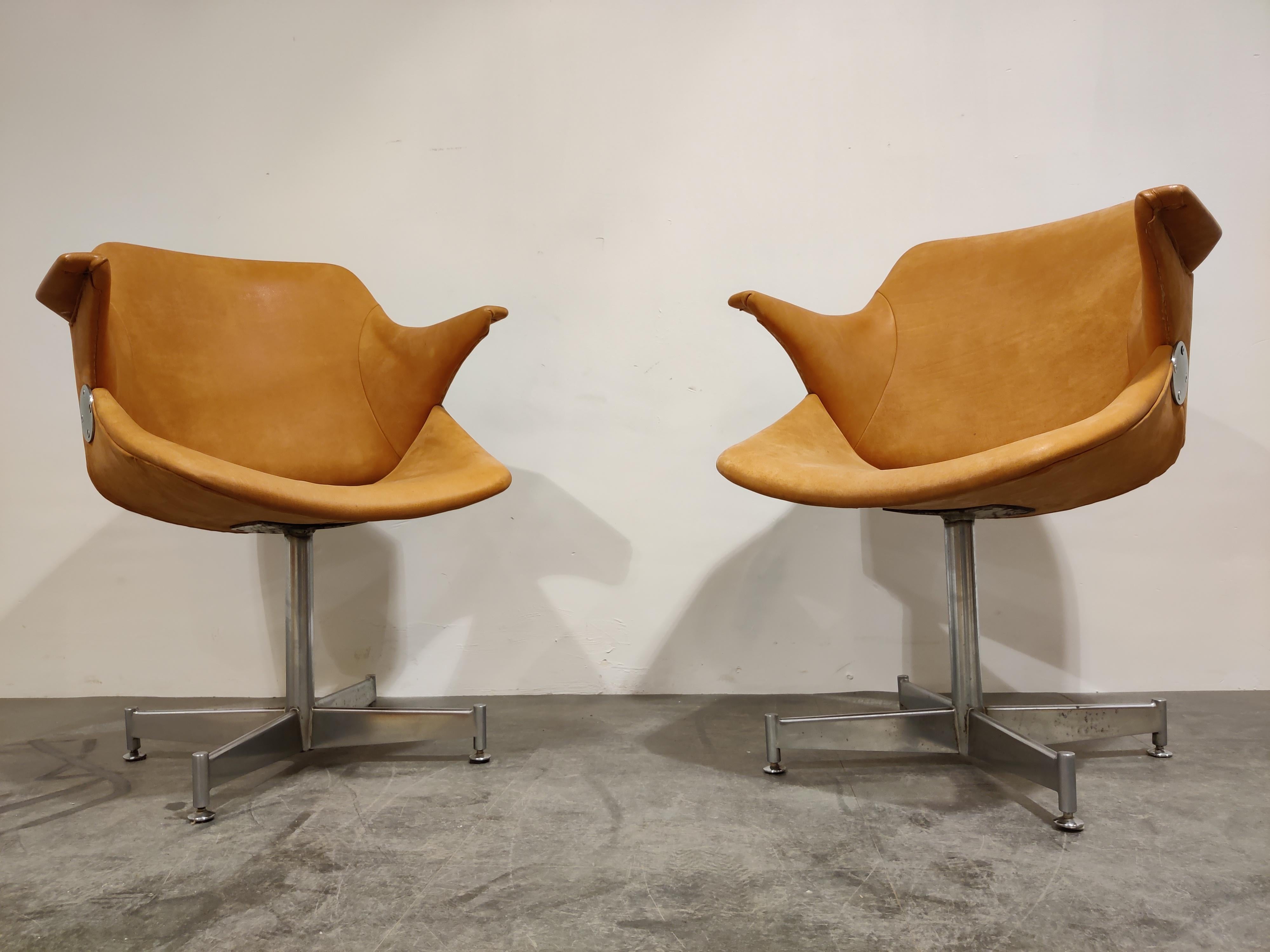 Pair of fantastic looking leather armchairs designed by Geoffrey Harcourt in the 1960s. 

The chair's model name is 'exquis' and they where produced by artifort.

These are quite rare and have a, in our own opinion, beautiful timeless design.