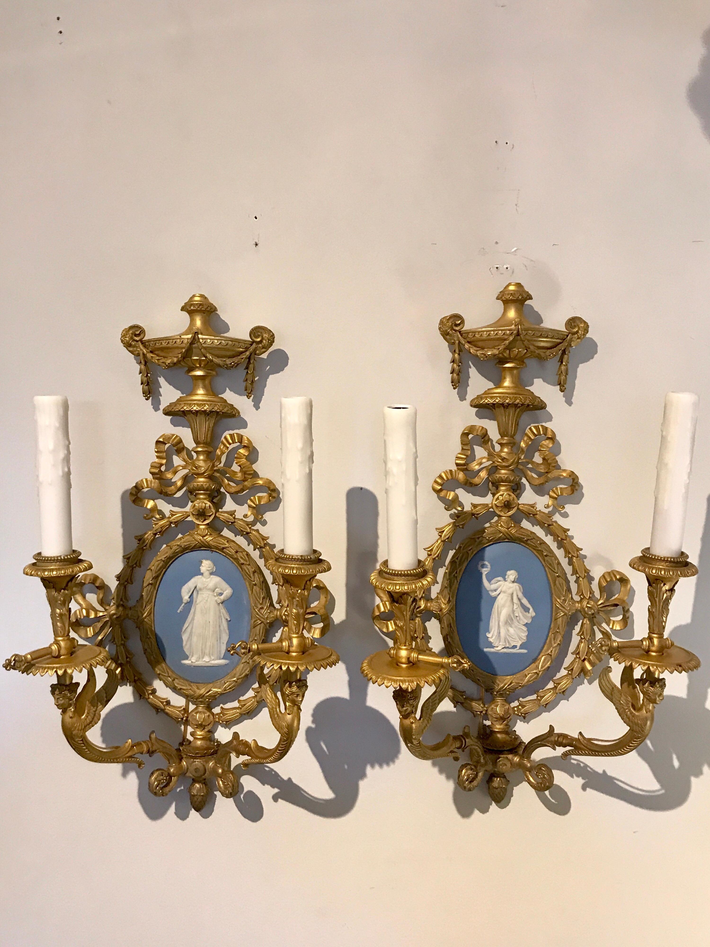 Pair of exquisite Adam style ormolu wall sconces with Wedgwood plaques, originally fitted for gas, now electrified.