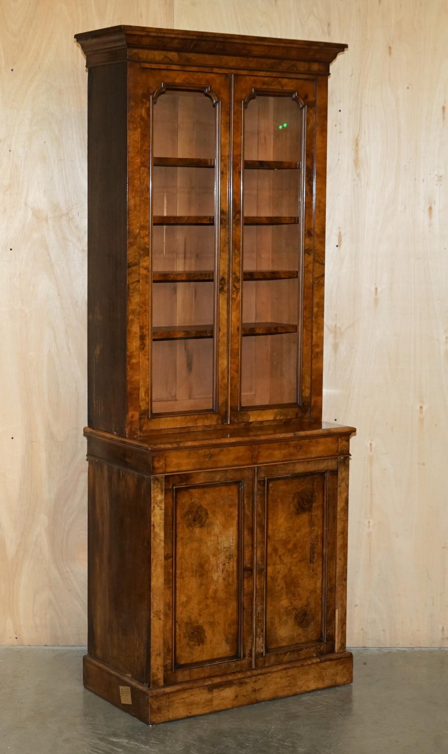 Royal House Antiques

Royal House Antiques is delighted to offer for sale this lovely pair of original Antique Victorian Circa 1860-1880 Burr Walnut Library bookcases with glazed tops and waterfall chests of drawers to the base

Please note the