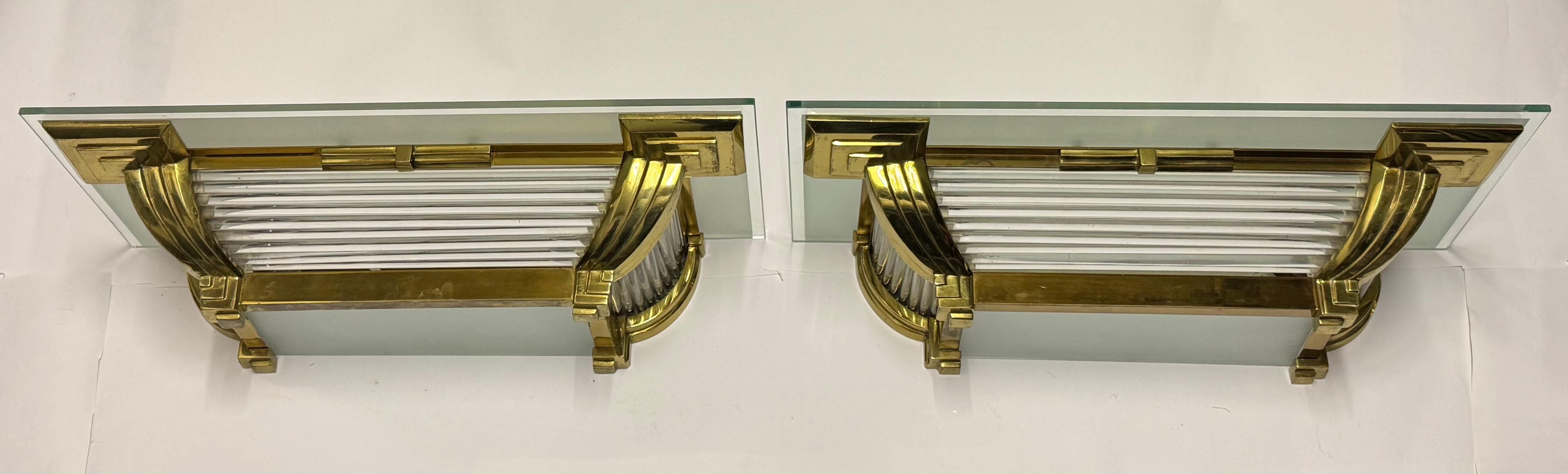 An exquisite pair of French bronze and glass wall sconces by Petitot (signed),France circa 1930s.
Lamp socket: each two x b22 (french bajonett)

  