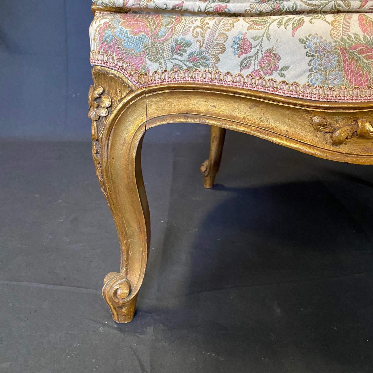 Pair of Exquisite French Louis XV Giltwood Wingback Chairs For Sale 5