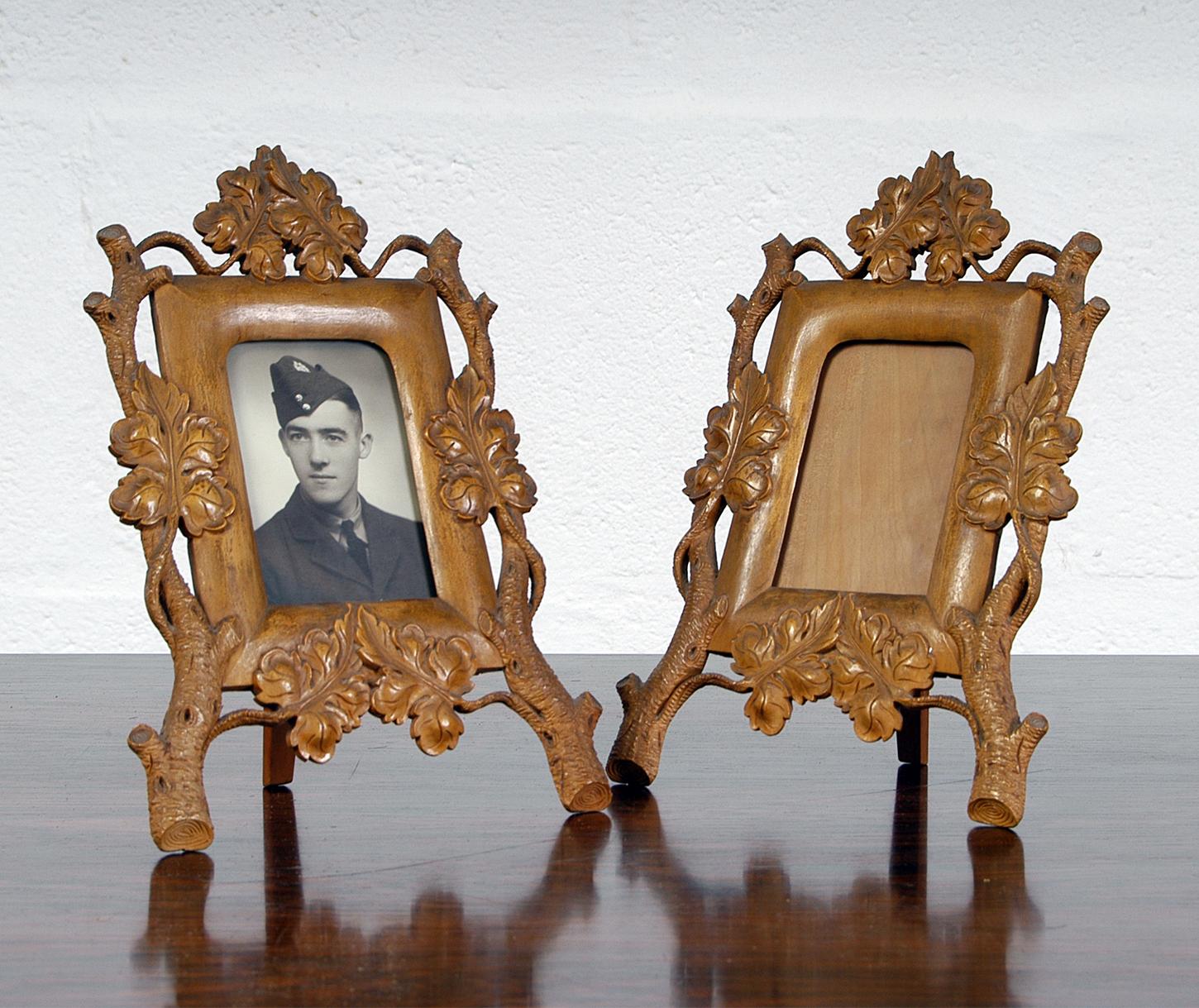 Pair of utterly charming early 20th century Swedish carved boxwood picture frames. Beautifully carved with extraordinary attention to detail, particularly on the tree bark.
The rear panel with swing out leg, slides down to allow space for a 6.5cm x