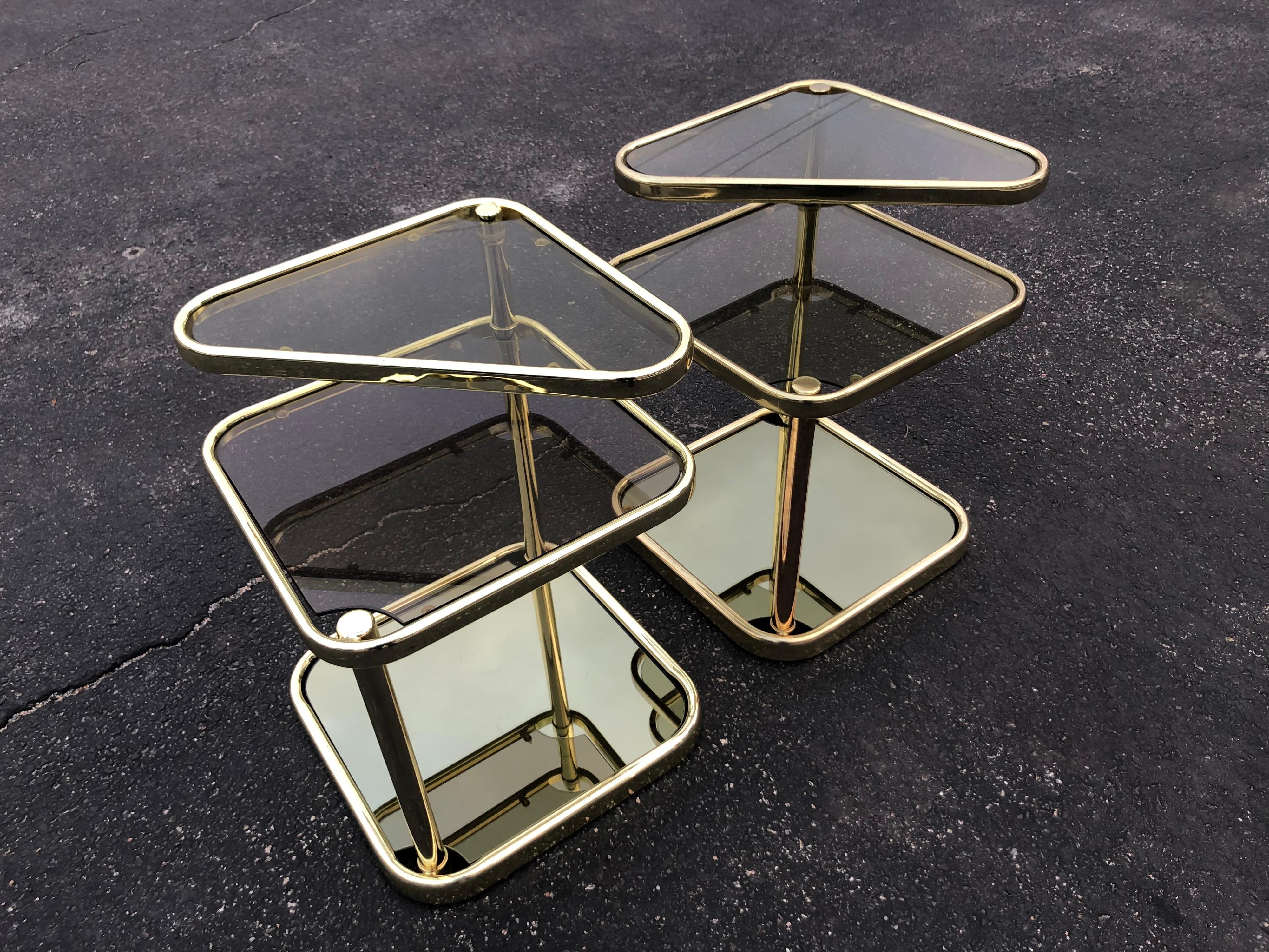 Late 20th Century Pair of Extendable Three Tier Brass and Smoked Glass Tables For Sale