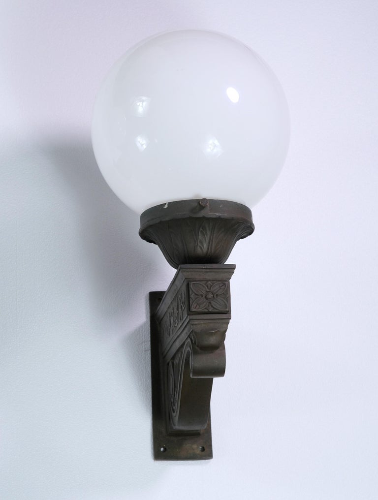 Pair of Exterior Bronze Wall Sconces w/ Foliate Details and Round Glass