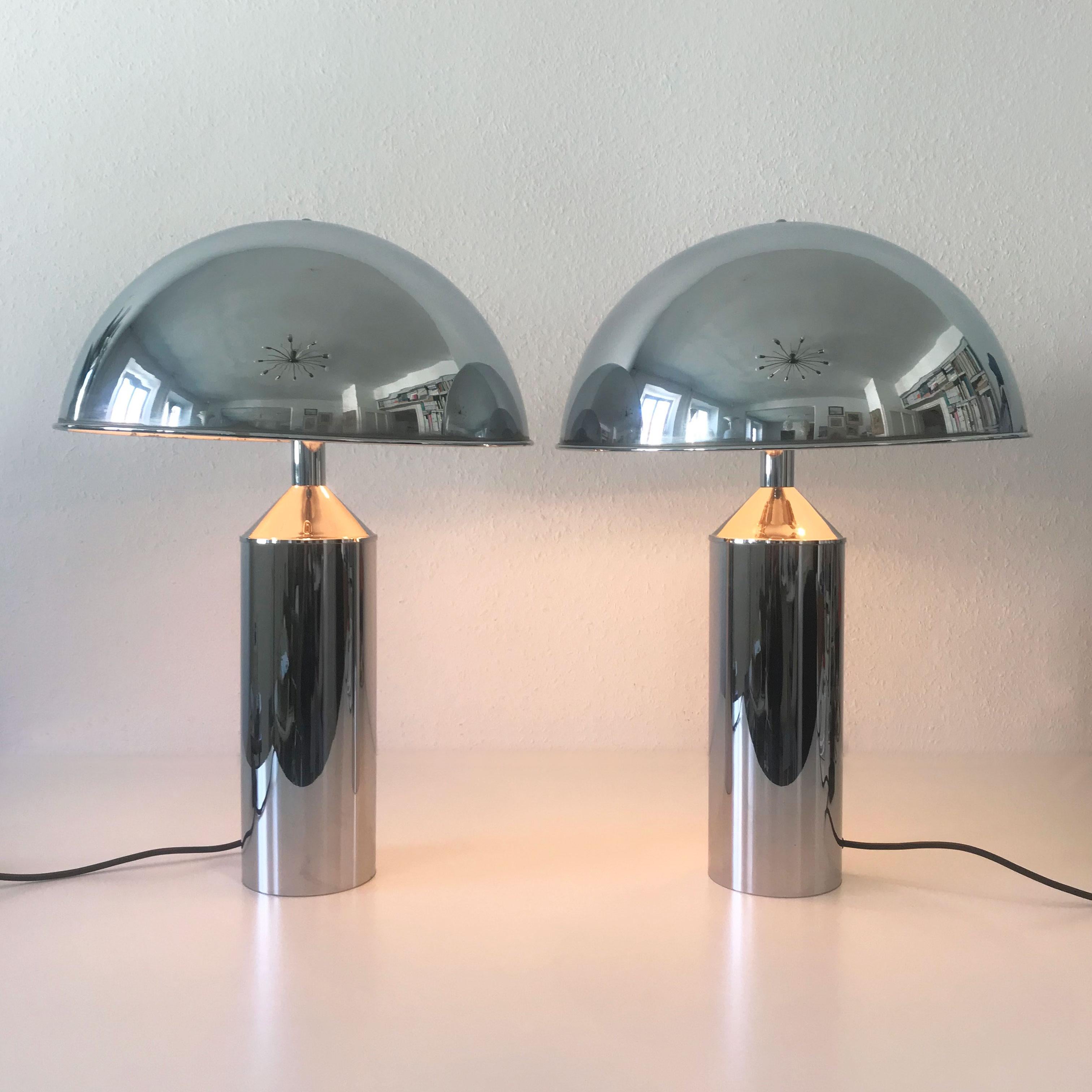 Pair of extremely rare, elegant and large Mid-Century Modern table lamps. Designed and manufactured by WKR Leuchten, Germany, 1970s.

These elegant table lamps are executed in chrome-plated metal. Each lamp is executed with 3 E27 screw fit bulb