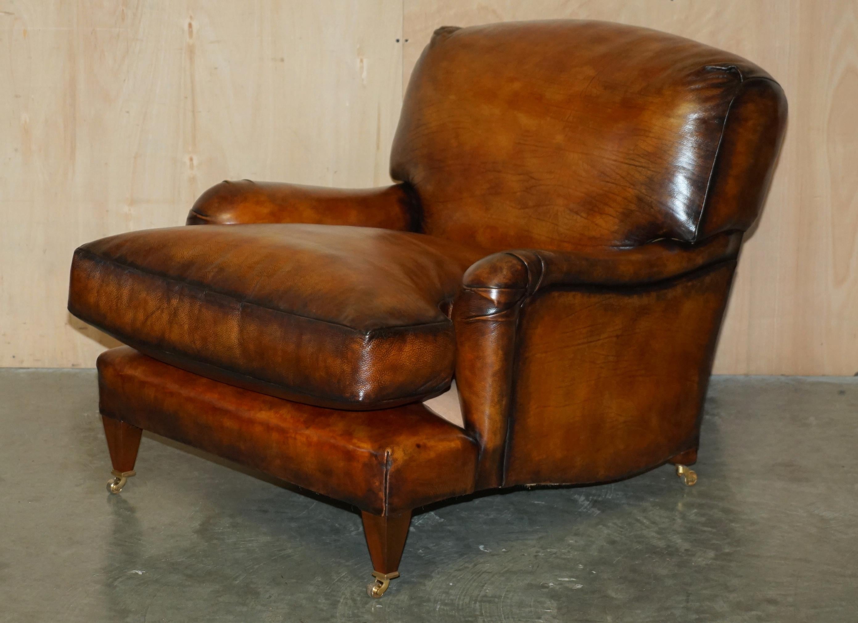 Royal House Antiques

Royal House Antiques is delighted to offer for sale this sublime large pair of fully restored Howard & Son's George Smith style Signature Scroll Arm cigar brown leather armchairs with oversized feather filled cushions.

Please