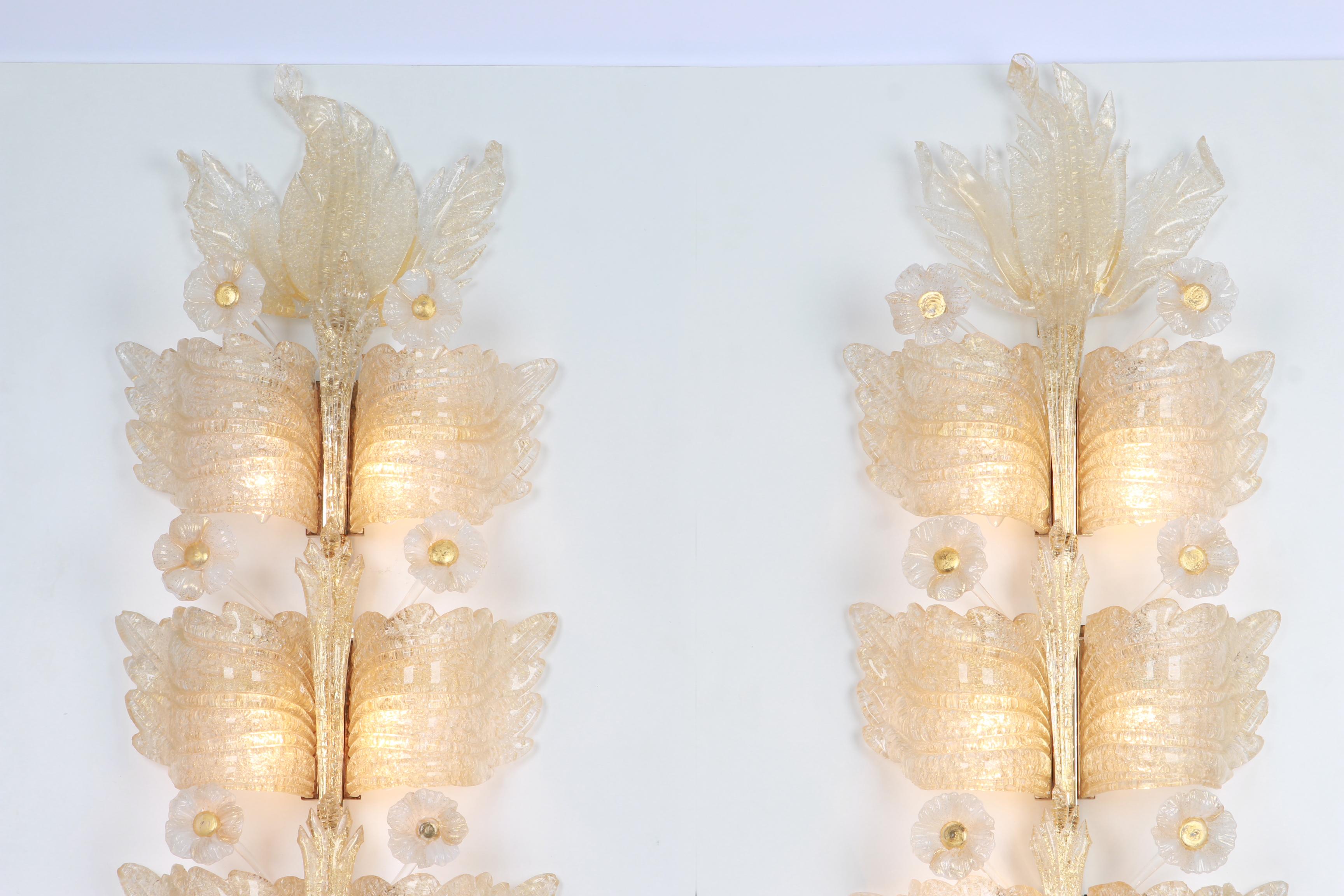 A gorgeous set of 2 sconces with 24-karat gold made by Barovier & Toso, Italy, circa 1970-1979.
High quality, Hand made, and in very good condition. Cleaned, well-wired, and ready to use.

Each sconce requires 6 x E14 standard bulbs with 60 W