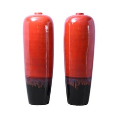 Pair of extra tall decorative ceramic vases, 1960s, glazed in ox blood red