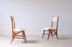 Pair of extraordinary oak chairs with upholstered fabric seat