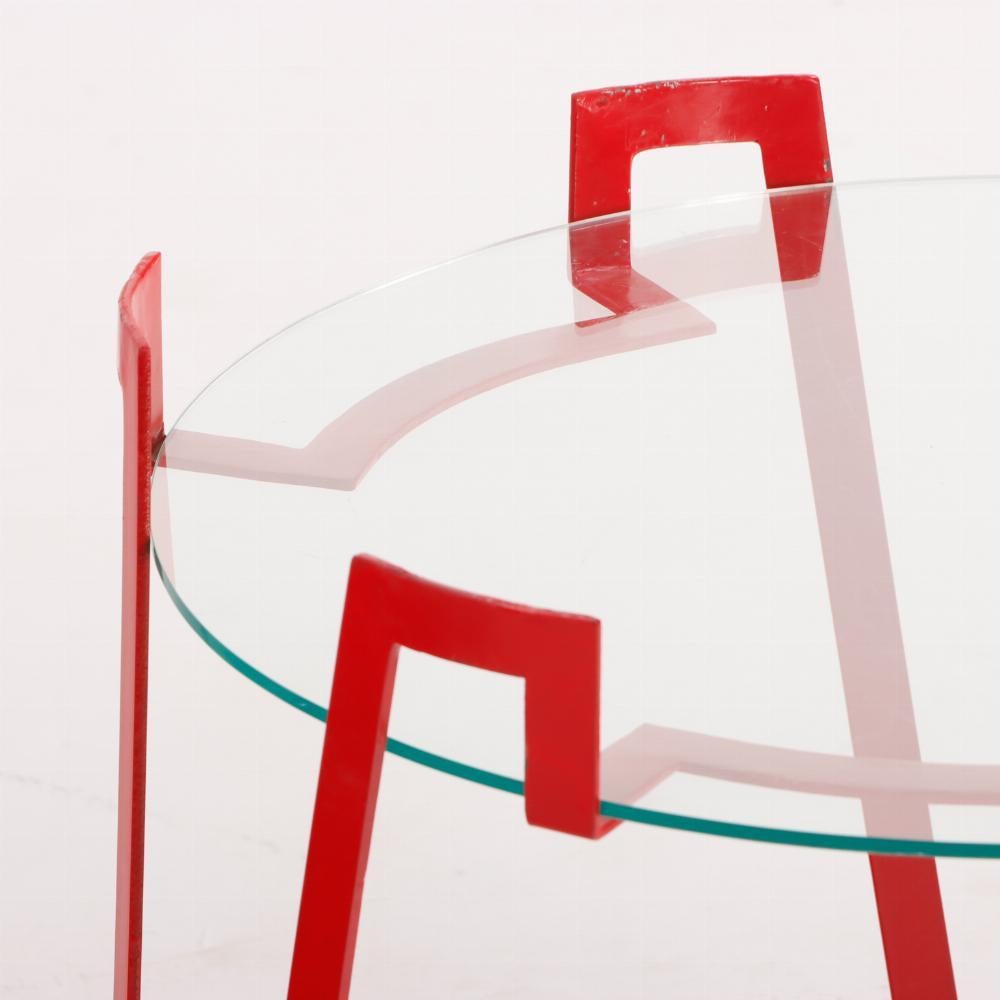 Argentine Pair of eye-catching red iron end tables. For Sale
