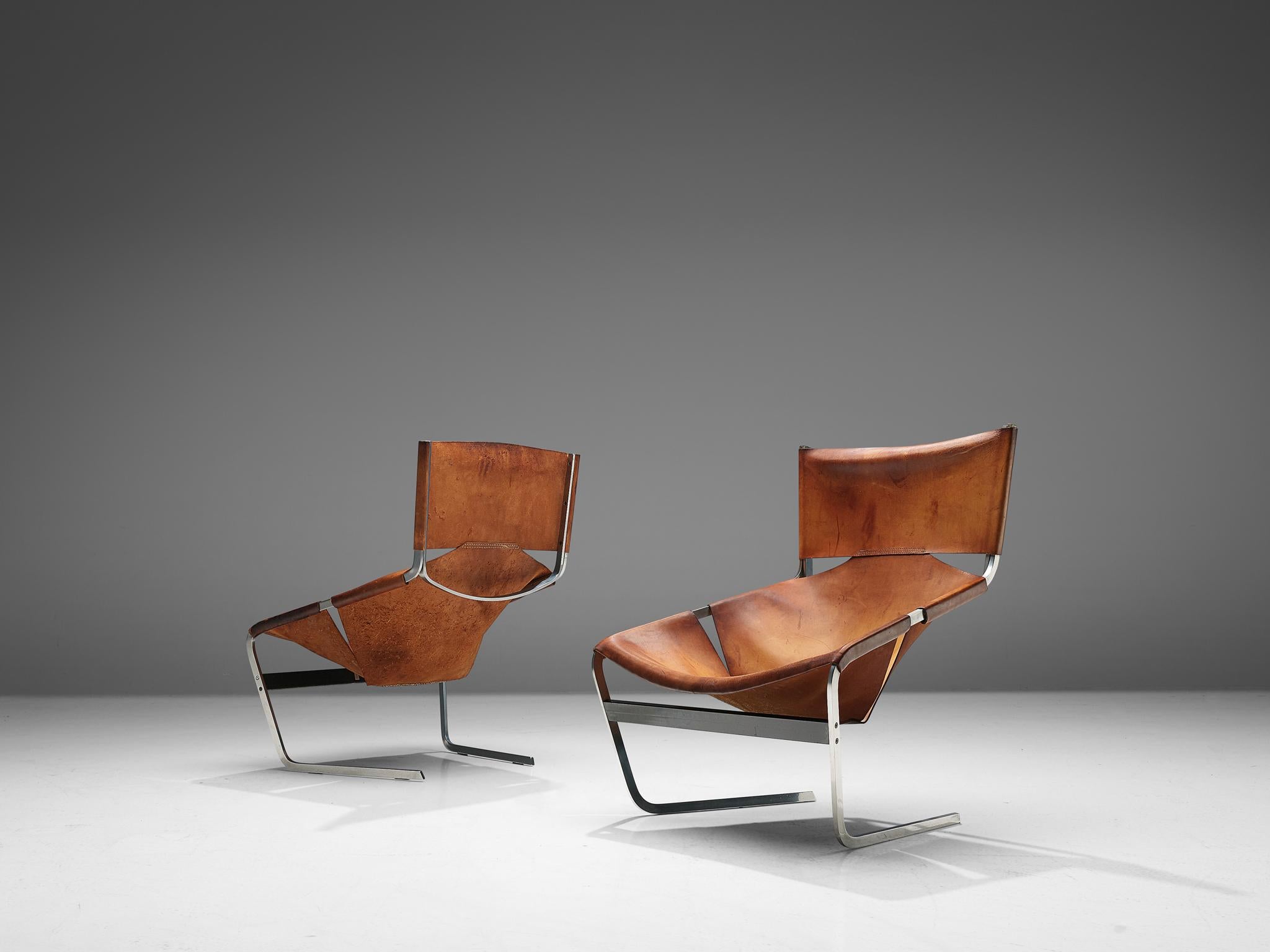 Pierre Paulin for Artifort, F-444 easy chair, metal and cognac leather, the Netherlands, circa 1962.


Cognac leather F-444 lounge chair, designed by Pierre Paulin for Artifort in 1962. The chair shows sharp lines and an angled open seat that