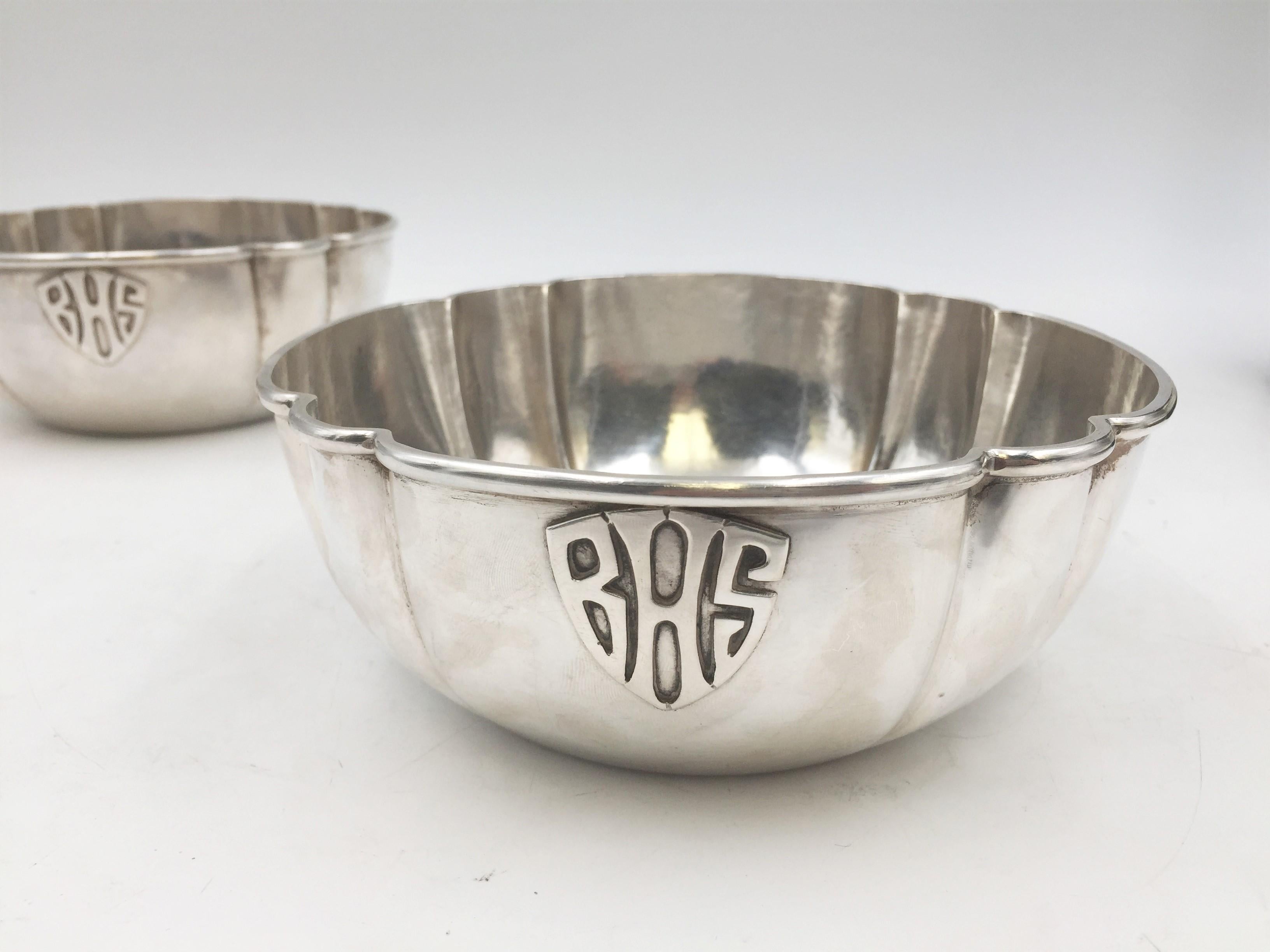 Pair of F. Novick, American, 20th century, beautifully handwrought / hammered round sterling silver bowls in Arts & Crafts Style. Each measures 6 1/3'' in diameter by 2 1/2'' in height, weighs 10.2 ozt (20.4 ozt total), and bears hallmarks and a