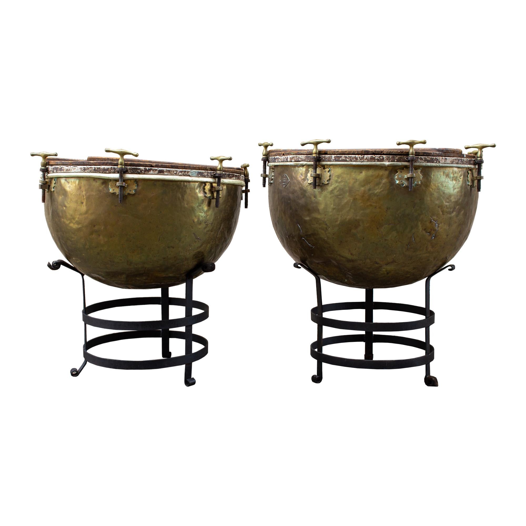 Discovered during our recent European travels, we instantly fell in love with this pairing of antique drums on iron stands crafted by noted musical instrument maker F. Van Cauwelaert from Belgium during the 19th century. Many of Van Cauwelart's