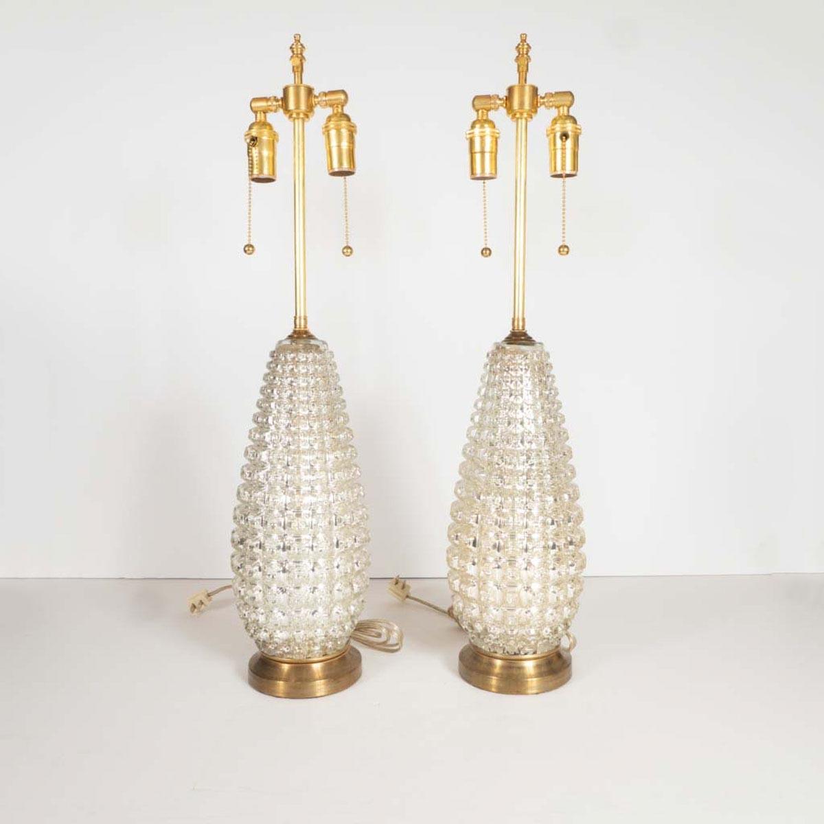 Pair of faceted mercury glass table lamps with brass hardware.