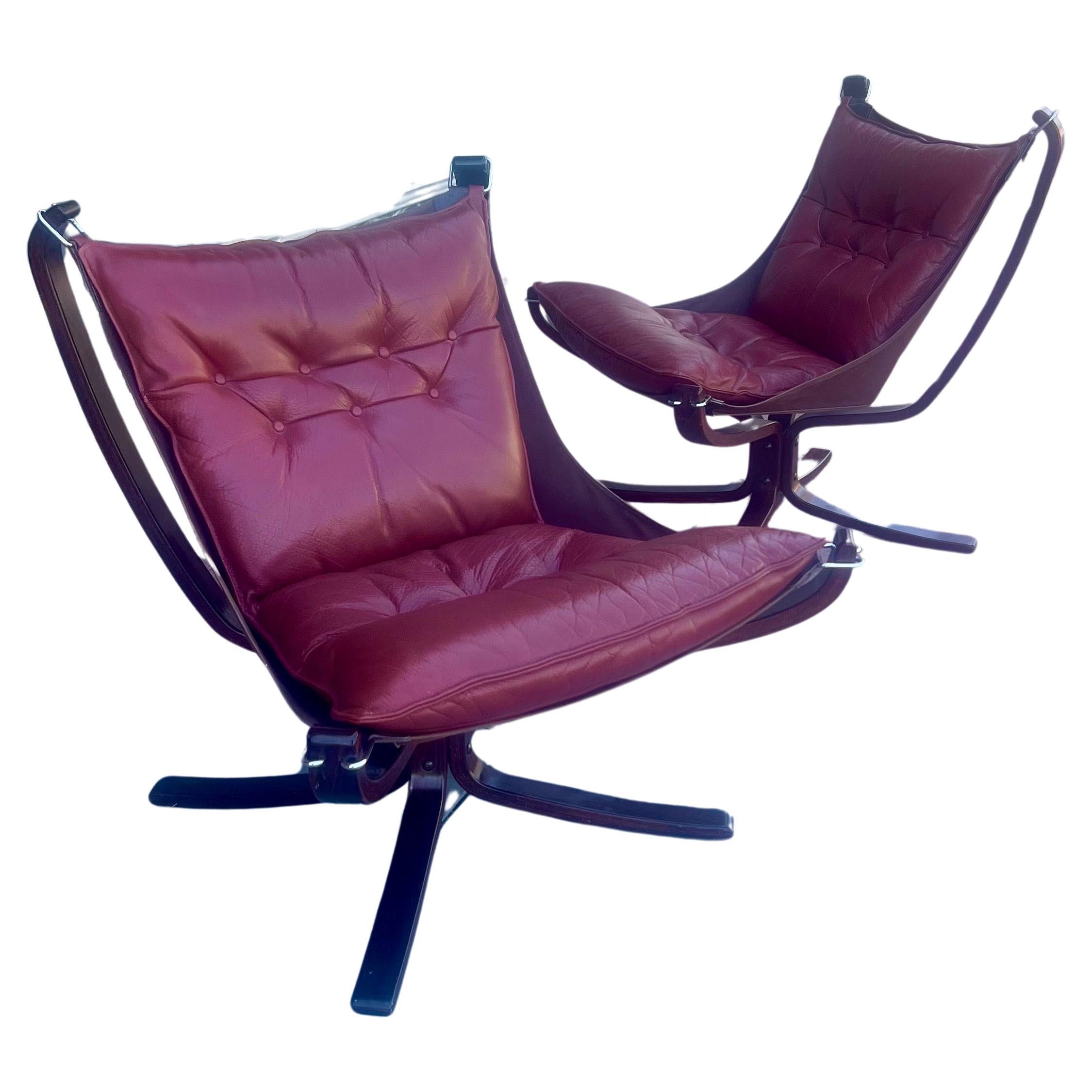 Pair of hard to find Falcon chairs, designed by Sigurd Ressell in Norway for Vatne Møbler circa 70s. This mid-century design lounge chair has a beautiful rosewood frame. As beautiful as it is strong. The frame looks fragile but is as strong as an