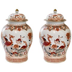 Pair of Famille Rose Porcelain Vases with Covers