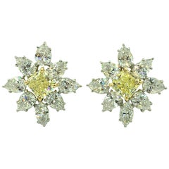 Pair of Fancy Yellow Diamond and Diamond Earrings