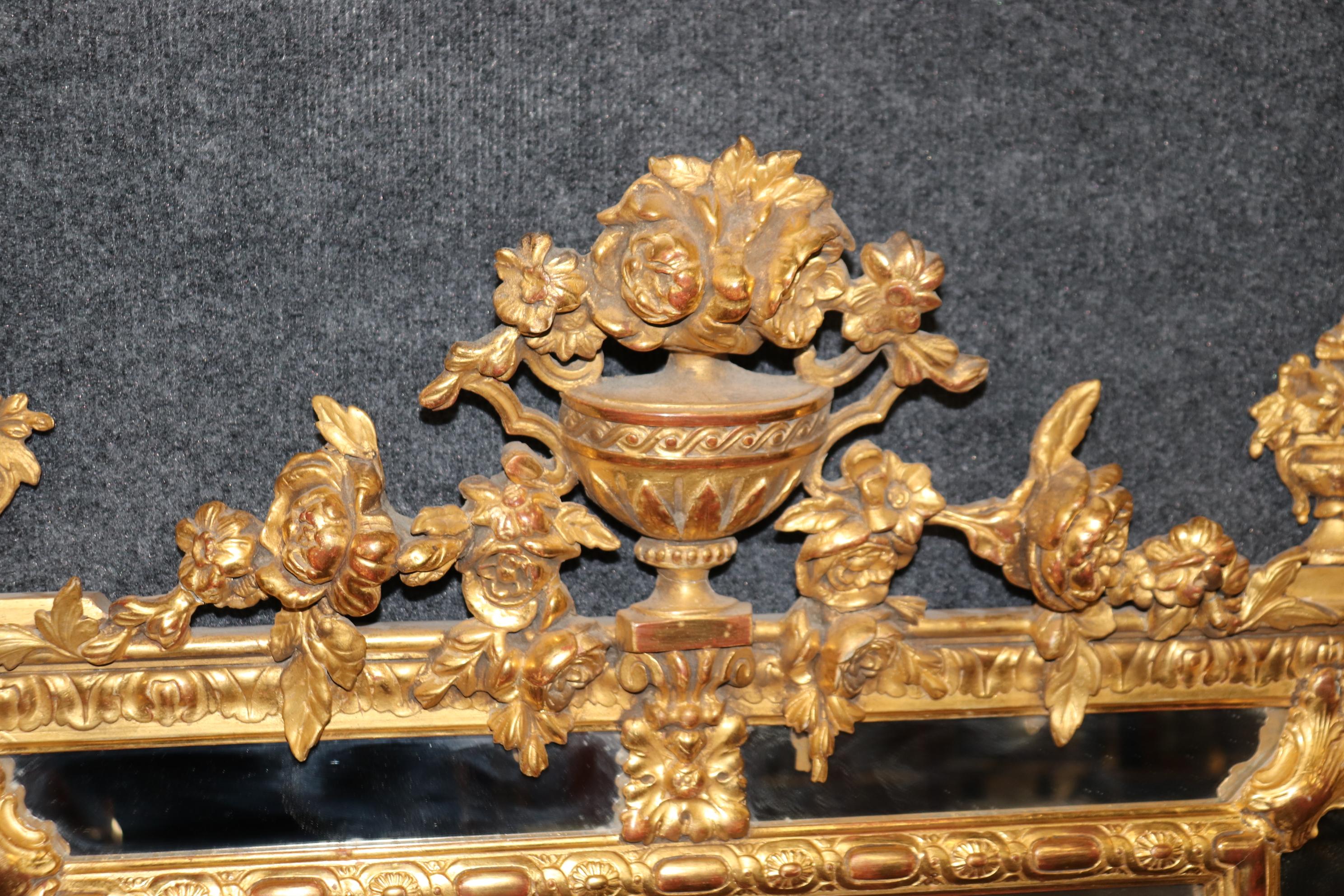 Pair of Fantastic Gilded French Louis XV Style Mirrors with Floral Motif In Good Condition In Swedesboro, NJ