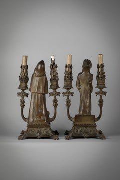 Pair of 'Fantasy' Patinated Bronze Two-Light Candelabra Lamps, circa 1910
