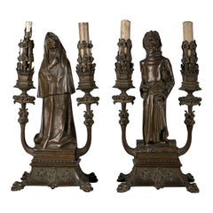 Pair of 'Fantasy' Patinated Bronze Two-Light Candelabra Lamps, circa 1910