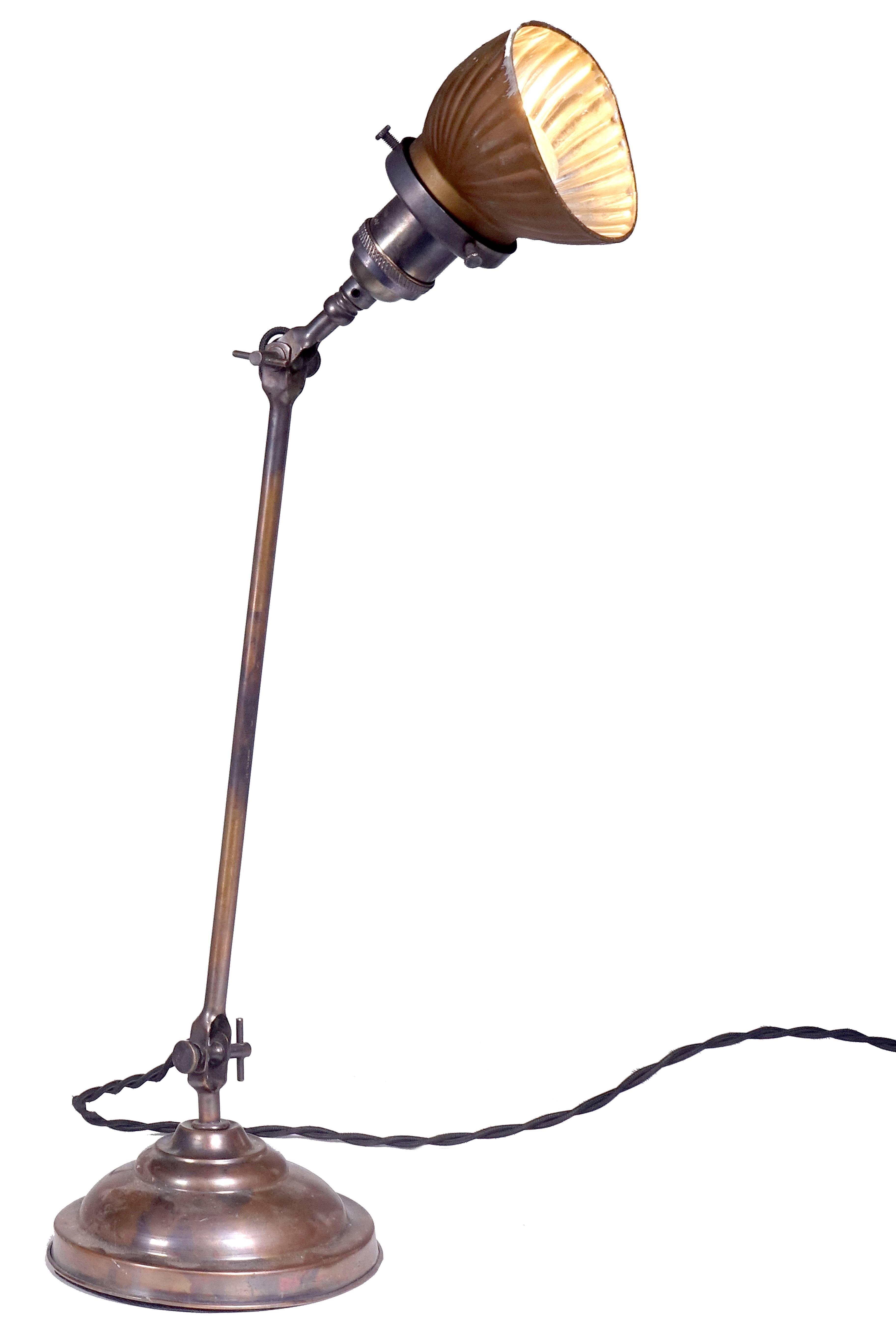 This is a beautiful matching pair of industrial lamps by the Faires Lighting Company. Both have the original Japanned copper or black finish and mini X-Ray Mercury glass shades. The shades have very good mirror finishes and the outside has a rustic