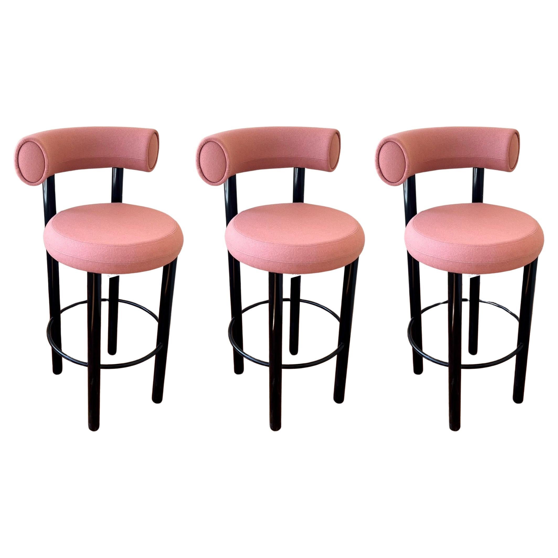 pair of Barstools these were custom made we have another set of 3 available, but we were not able to use these sets we had to wait 6 months for them our loss is your win. these are new metal frames in a black enameled finish with pink upholstery