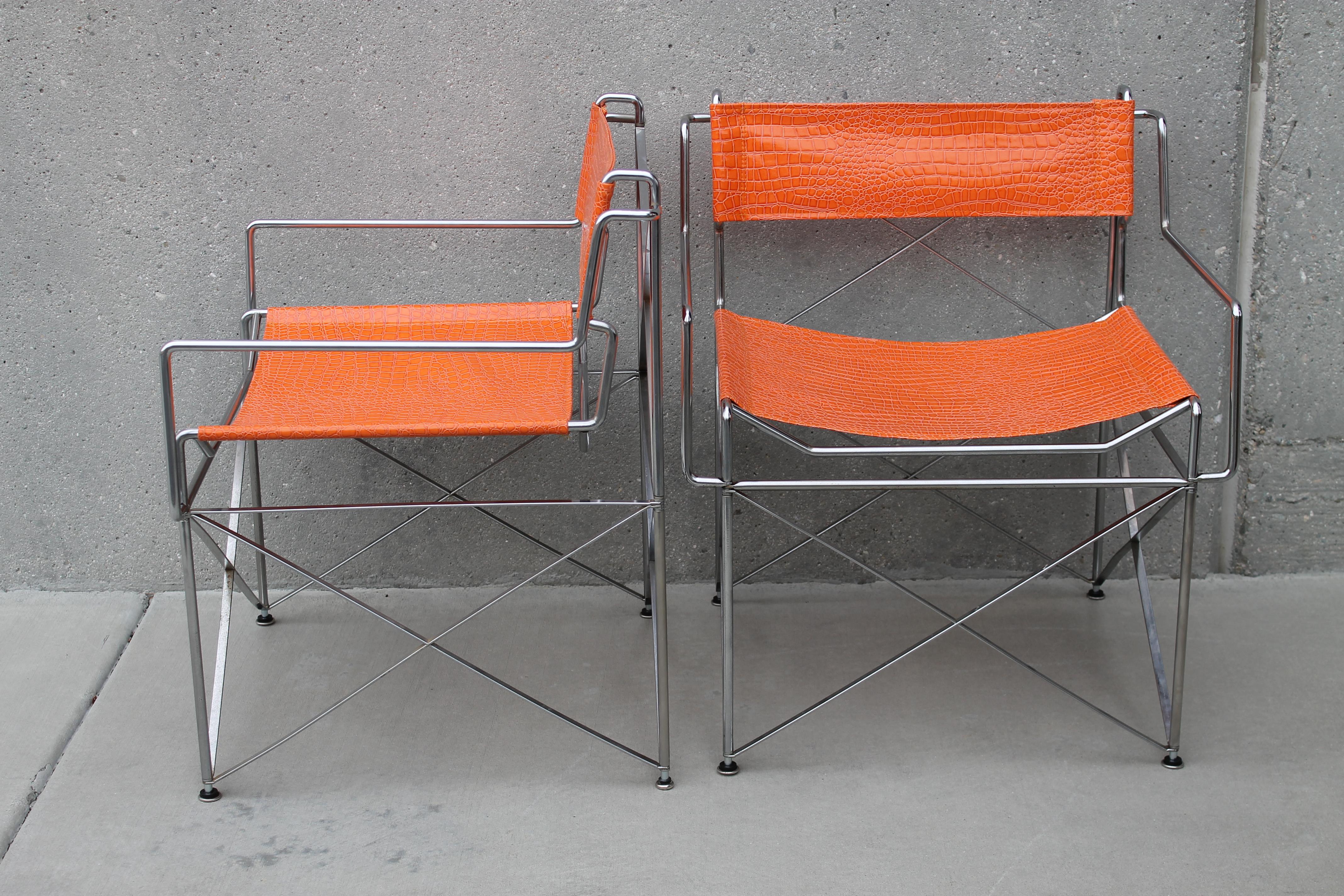 Pair of steel and faux alligator covered chairs. Each chair measures: 25