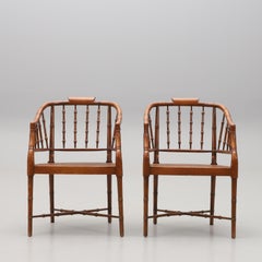 Pair of Faux Bamboo and cane armchairs, by Baker Furniture, United States 1950s