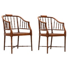 Pair of Faux Bamboo and cane armchairs, by Baker Furniture, United States 1950s