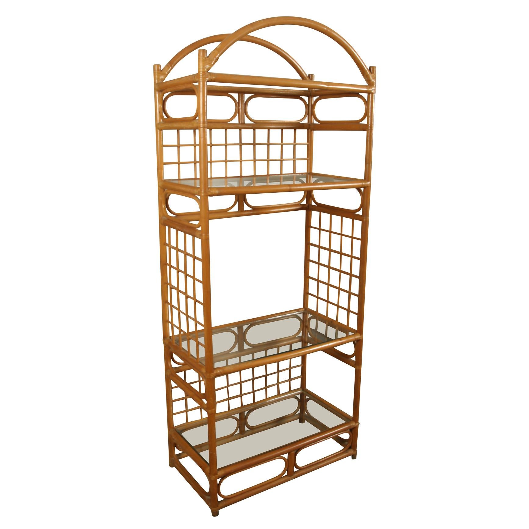 A stylish pair of faux bamboo étagères with four glass shelves. Well constructed and sturdy, this versatile pair provides is great for storage and display in any room!