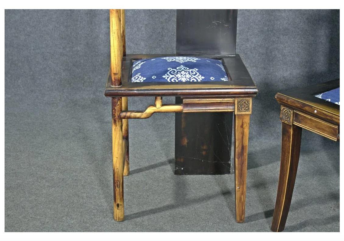 With an interesting design that doubles as a set of hall racks, this pair of chairs features ebonized bands of dark coloring across its frames as well as contrasting blue upholstery. Please confirm item location with seller (NY/NJ).