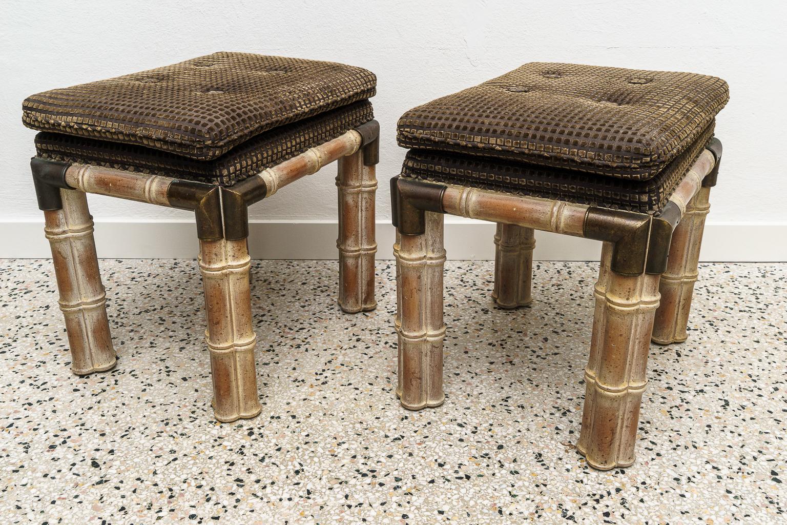 A pair of faux bamboo brown stools benches.

Note: There is a console table on our on our 1stdibs platform that complements these lovely stools LU928317853971.