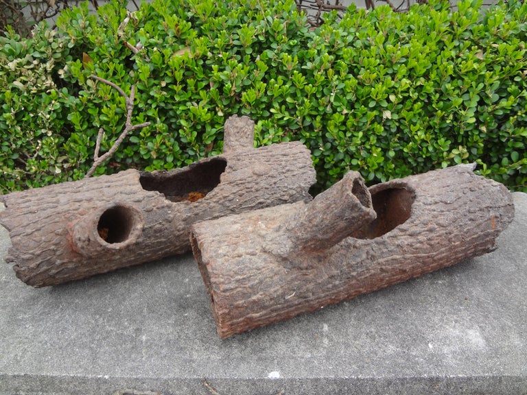 Pair of Faux Bois iron log sculptures.
Unusual vintage pair of faux bois iron log planters or sculptures. This unique pair of faux bois sculptures would look great as a cocktail table accessory or in a bookcase. Real conversation pieces!