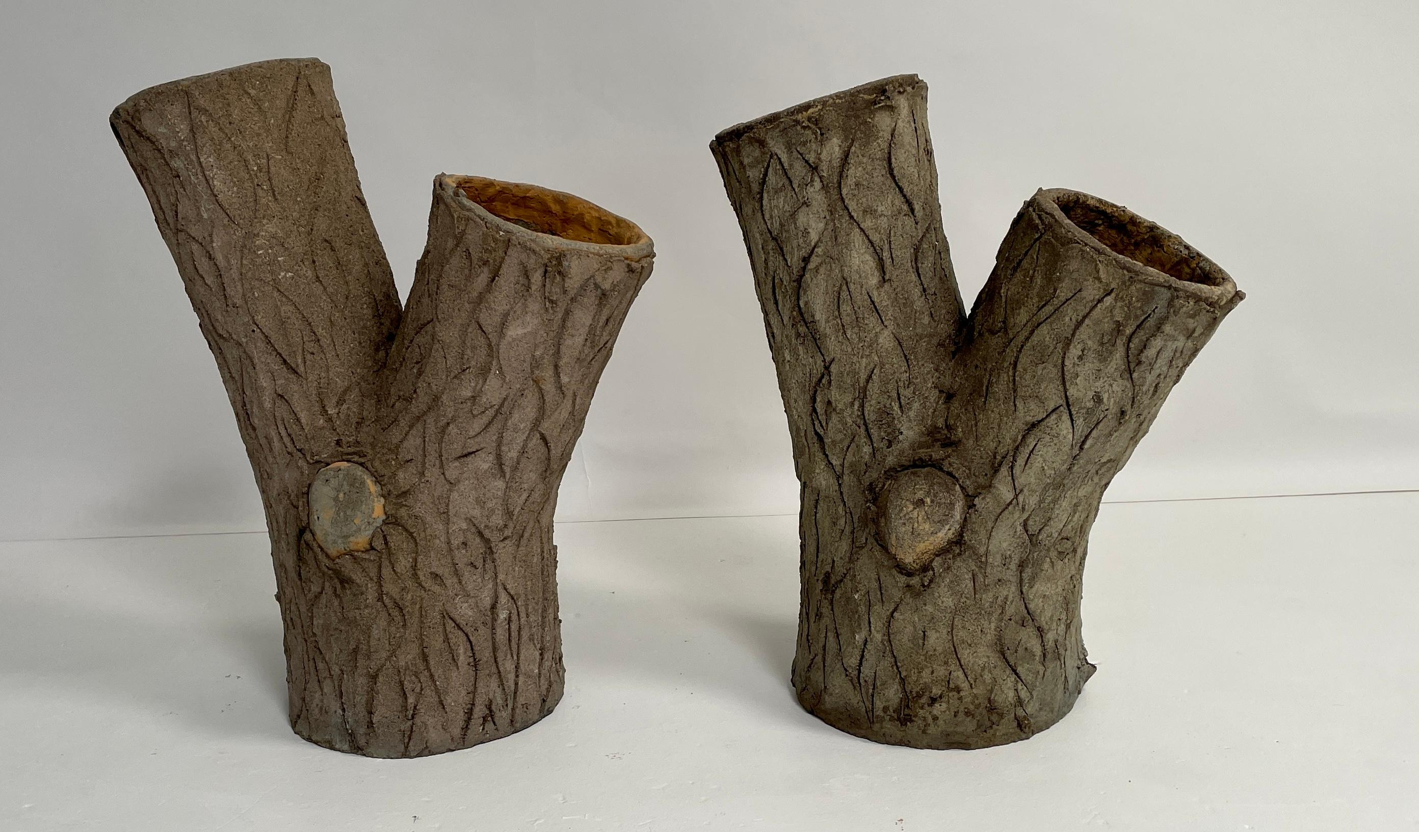 Two French Faux Bois jardinieres. these authentic planters are a pair. They have great details in the bark details with realistic knots. They solid with no cracks and have a drain hole. The mouths of each of the two openings is about 5