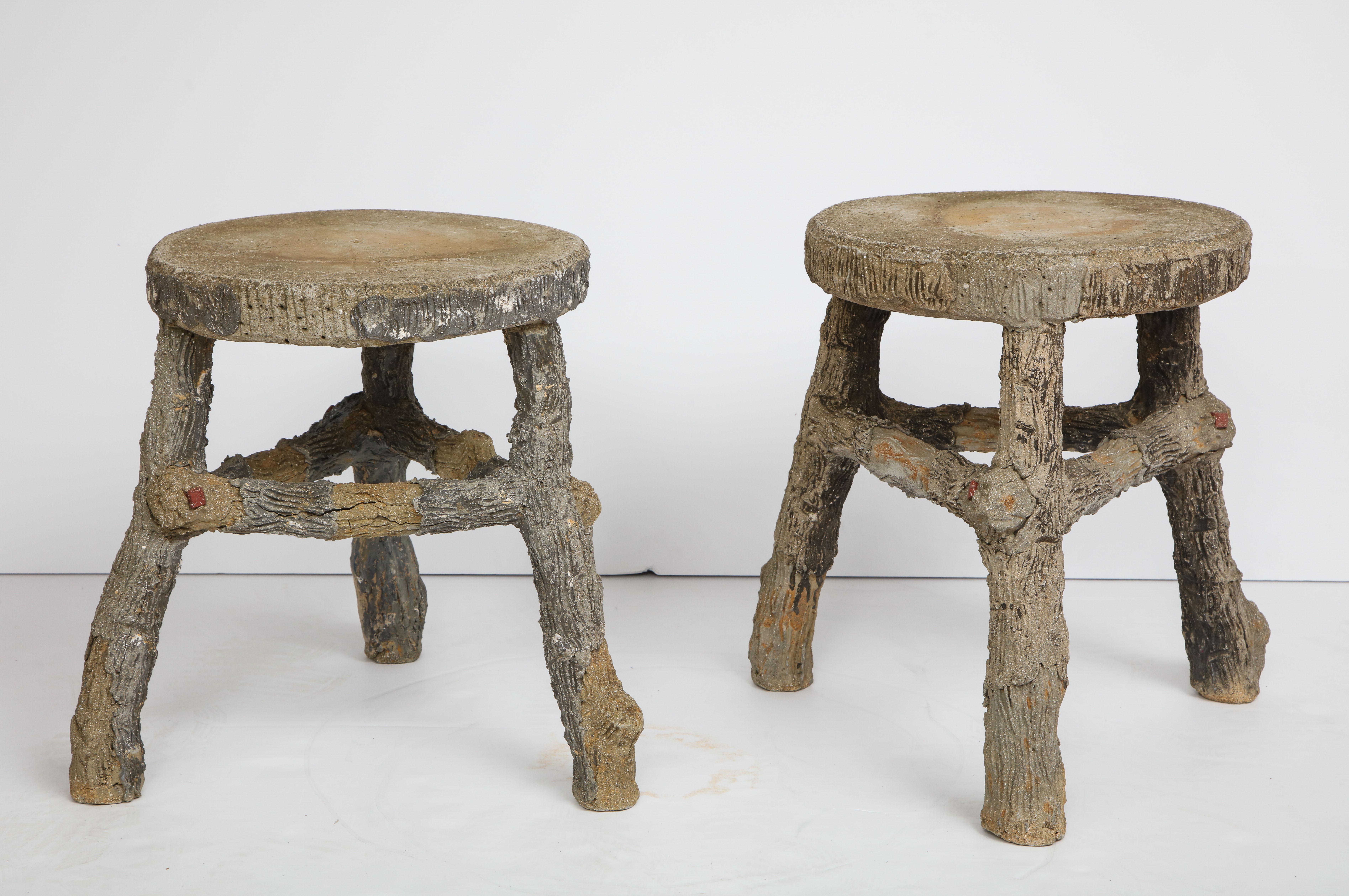 Artisan crafted matching pair of faux bois stools with beautiful patina.