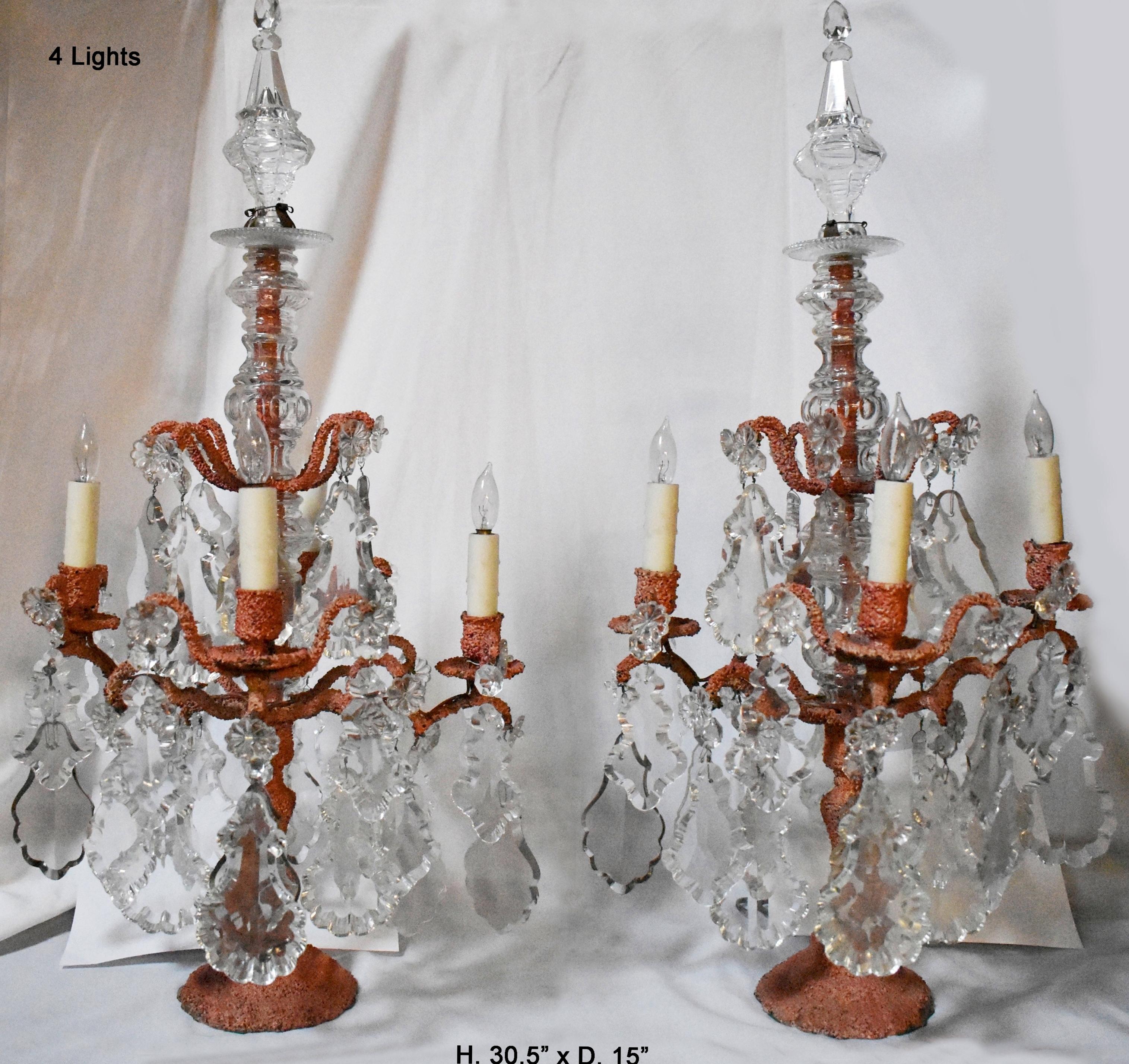 Spectacular 19 century French Louis XV style faux coral over bronze girandoles candelabras. 
Meticulous attention has been given to every details, unique shapes of prisms are used.
The candelabras can be used in both the center of the room and