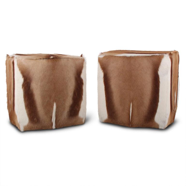 An unusual pair of faux-hide stools of cube form, circa 1990.



   