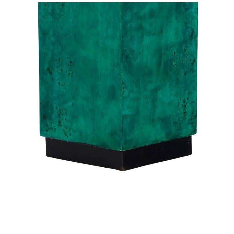 A pair of faux malachite pedestals.  The square burled wood pedestals are stained a beautiful shade of emerald green with the appearance of malachite gems.  A stunning addition to a room.