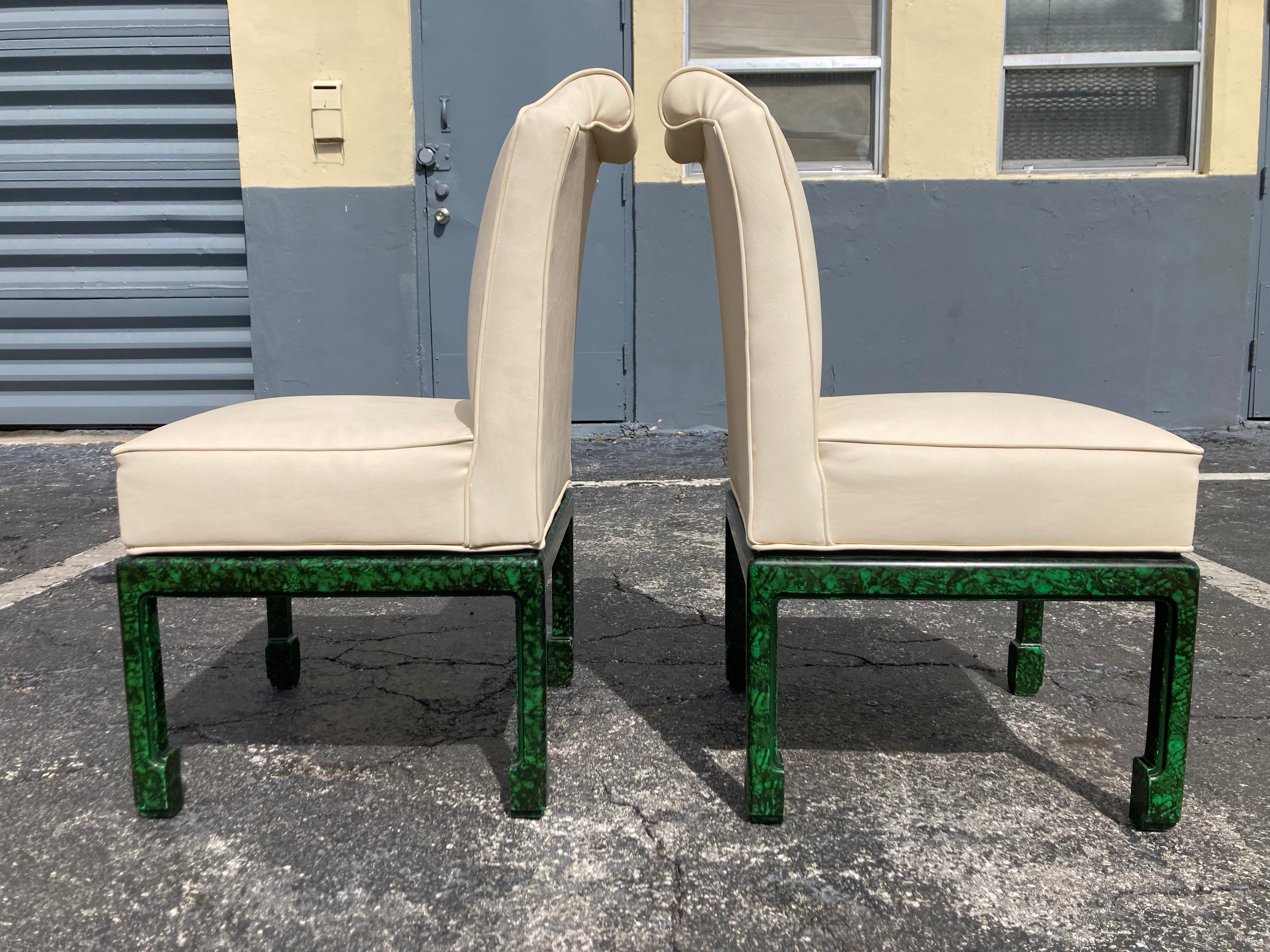 Pair of Faux Malachite Side Chairs, seats are vinyl. Good condition with some normal wear. No damages.