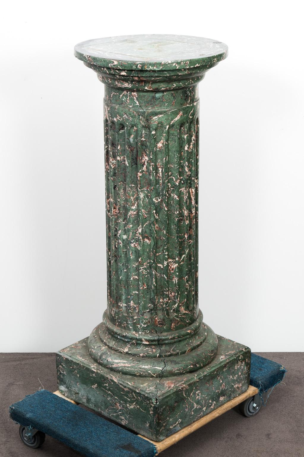 Faux marble fluted column pedestals in Scagliola finished stucco, circa 19th century.
  