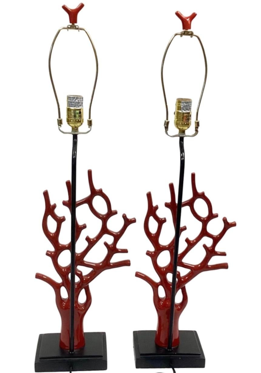 Pair of red faux coral lamps on black base topped with matching coral finial.

Dimensions:
29.5
