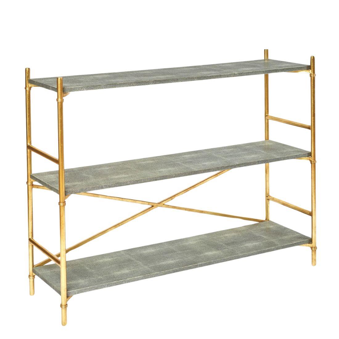A pair of etageres with faux shagreen shelves and a gilt metal frame.

